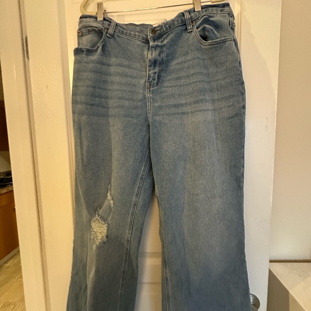 Distressed Blue Denim Jeans